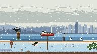 A snowy winter day on the shore: snow falls on the lawn, a dark seabird stands on a piling and birds float on the water.